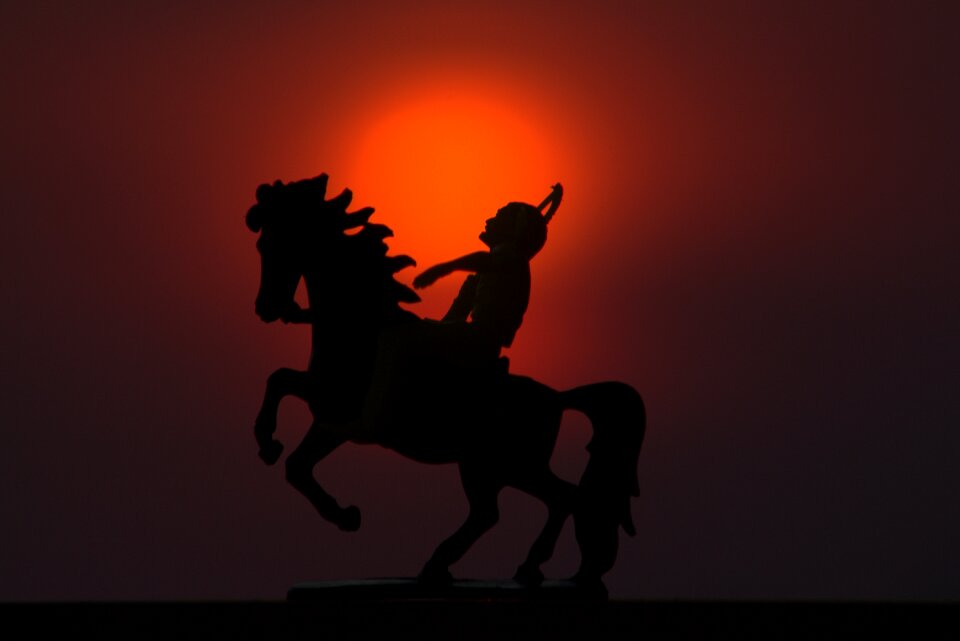 Riding sunset silhouette
