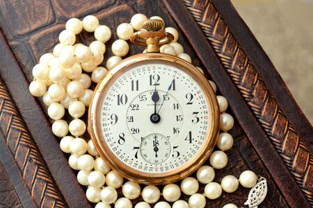 Clock pearl watch photo