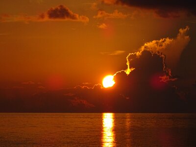 The setting sun clouds night
