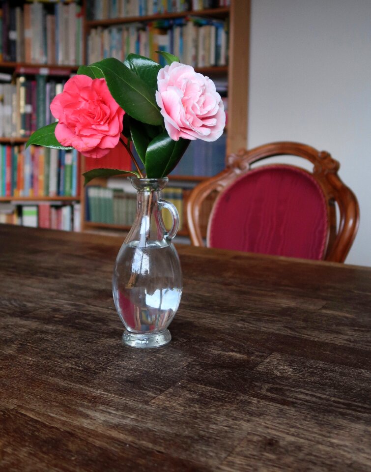 Background wooden table glass vase photo
