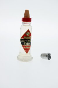 Container adhesive stick