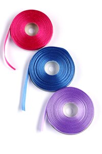 Roll of ribbon blue pink