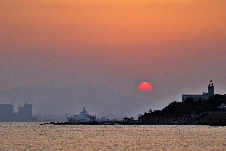 Dawn lighthouse sun