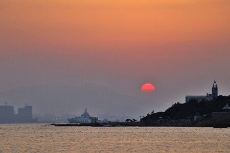 Dawn lighthouse sun photo