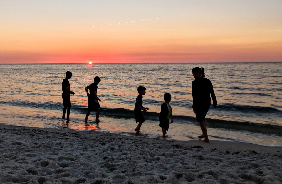 Sunset people silhouetted