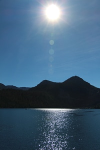 Sun mountain reflection photo