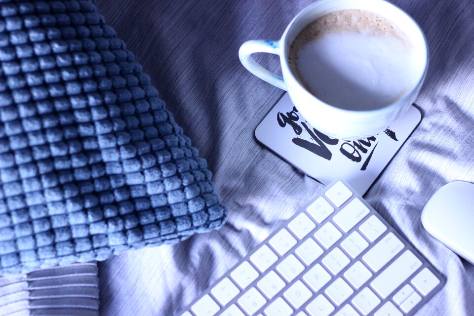 Below blue coffee blue keyboard
