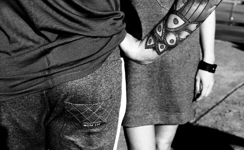 Black and white couple tattoo photo