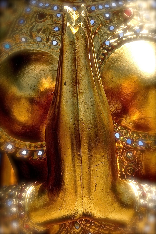 Pray gold sculpture