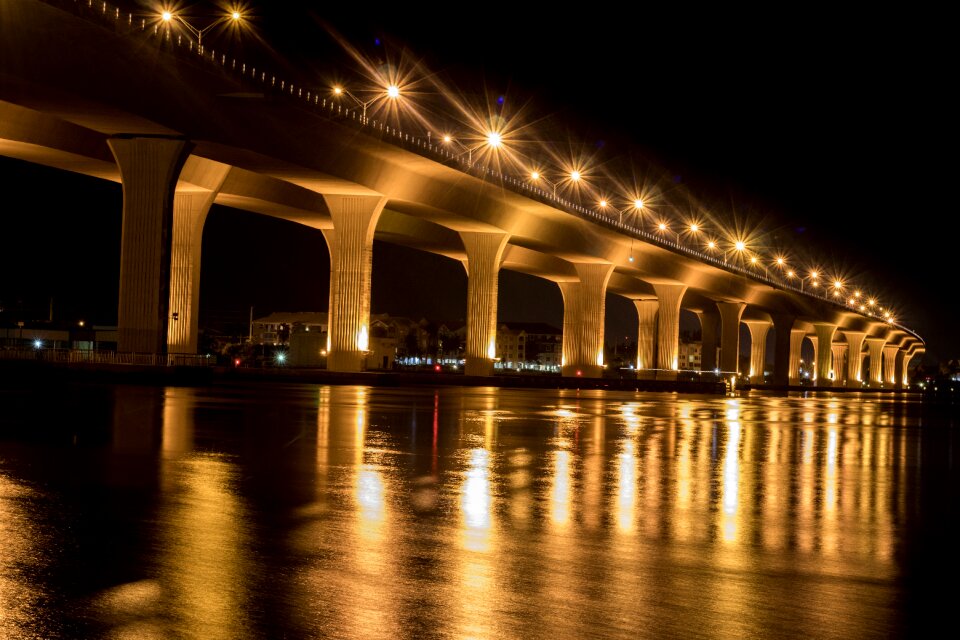 Bridge nighttime water photo
