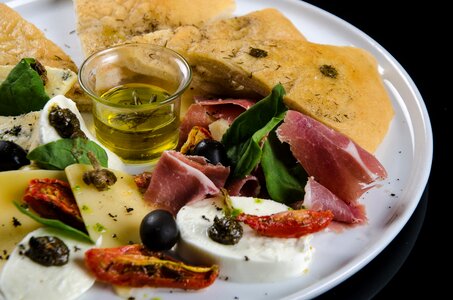 Black olives olive oil dish photo