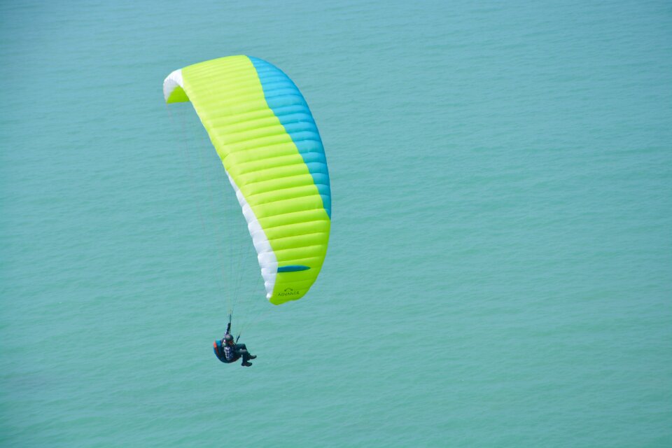 Leisure sports blue sea paraglider photo