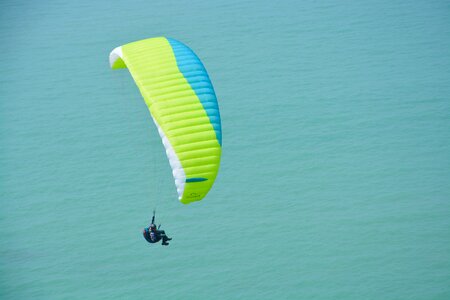 Leisure sports blue sea paraglider photo