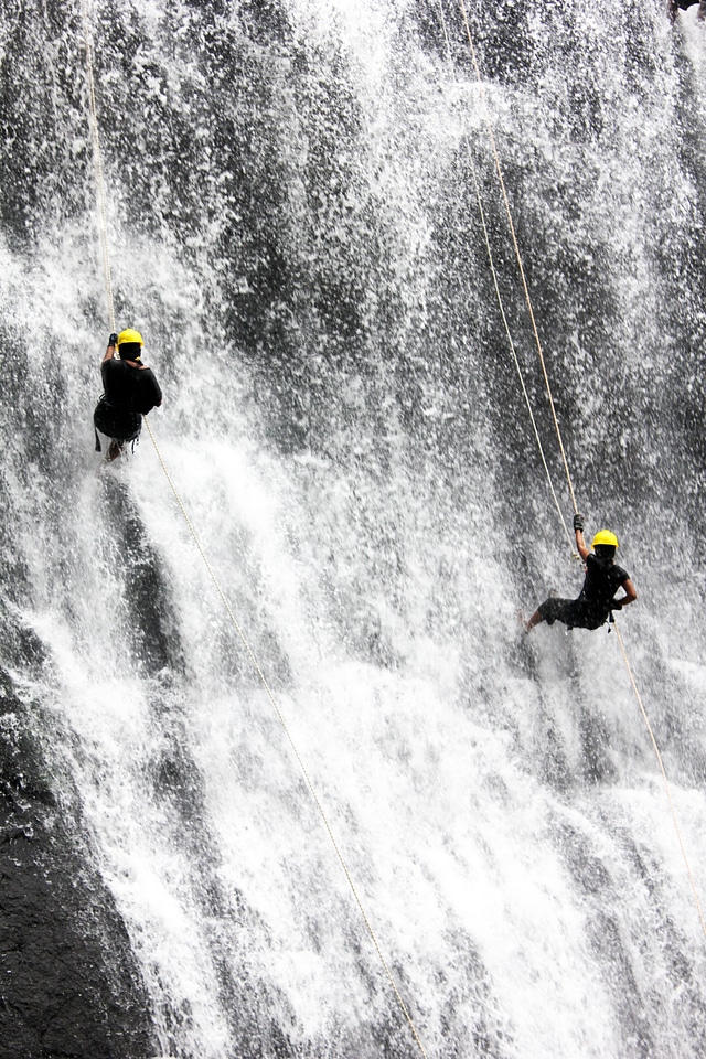 Rappelling climbing adventure