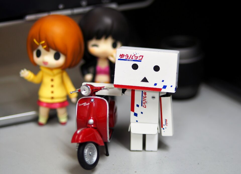 Red motorcycle figurine