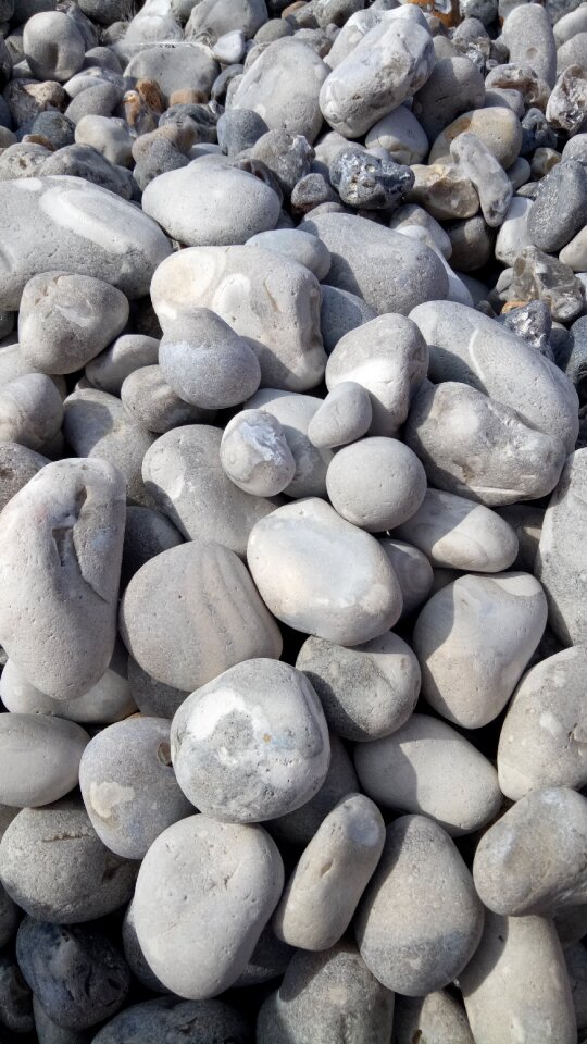 Normandy pebble beach boulders