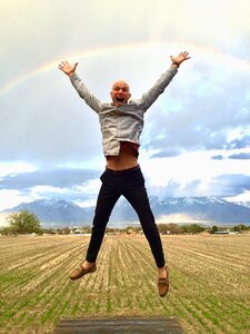 Jumping male man smiling photo