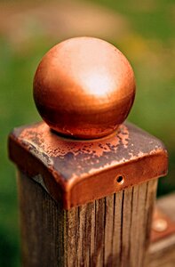 Wooden posts garden fence copper photo