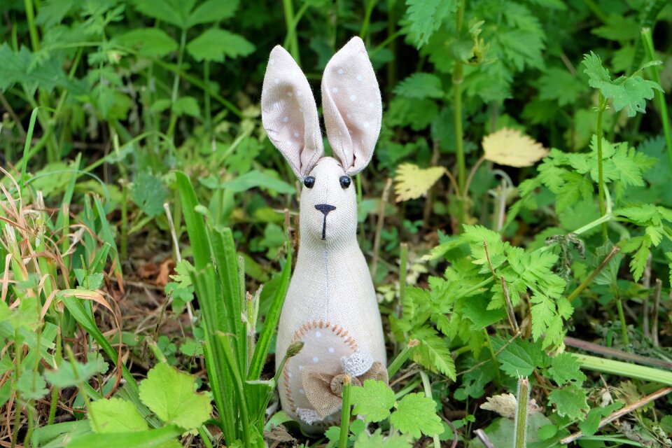 A toy bunny vintage rabbit in the grass