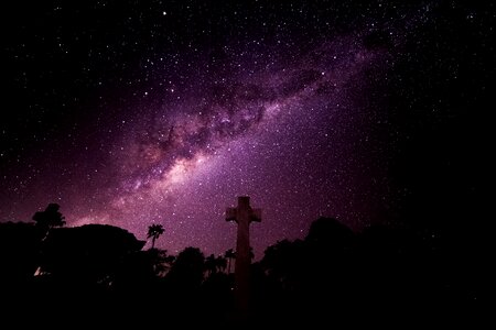 Under the sky night shot black cross