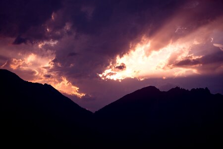 Lighting clouds mountains photo