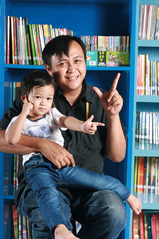 Happy kid sitting