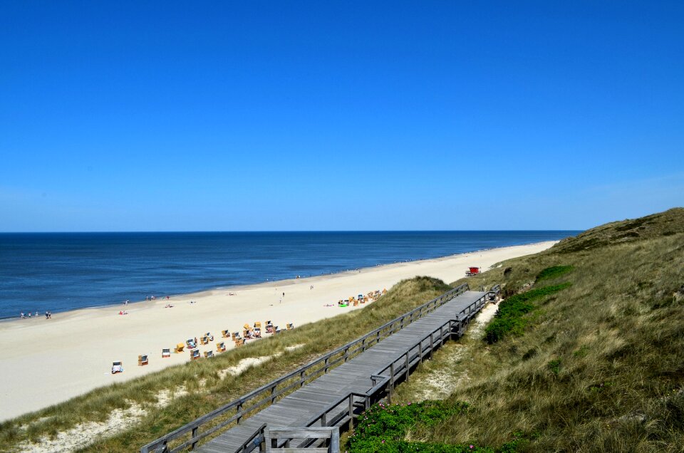 North sea beach wood stairs photo