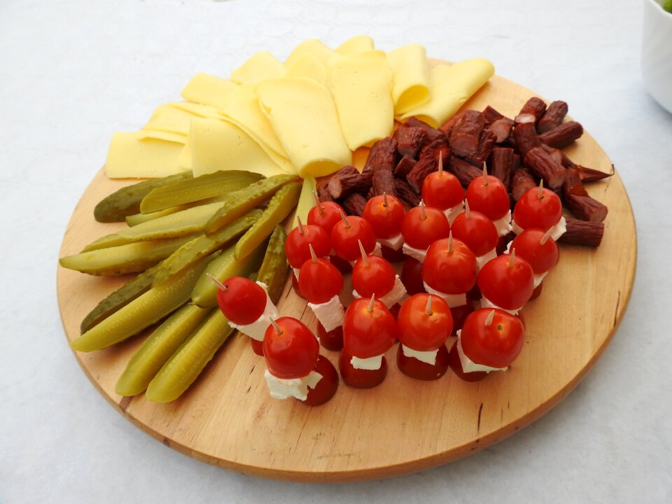 Yellow cheese pickled cucumbers tray