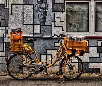 Delivery postman cycling photo