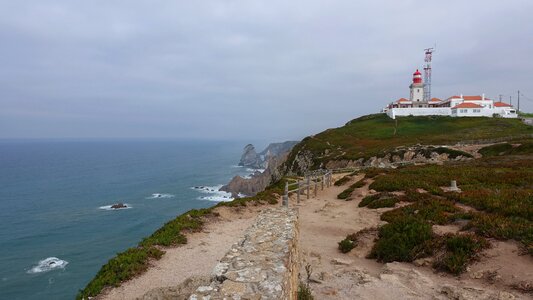 Atlantic horizon red lighthouse photo