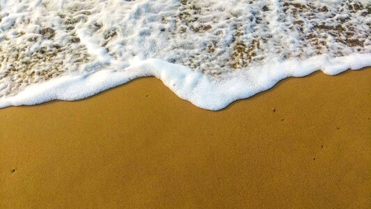 Waves sand