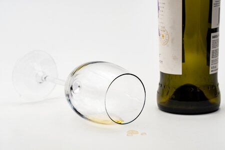 Depleted consumes wine glass photo