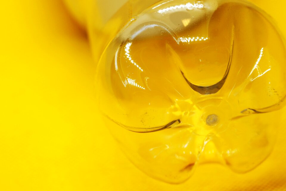 Empty yellow abstract yellow bottle