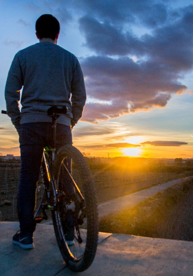Silhouette people cycling
