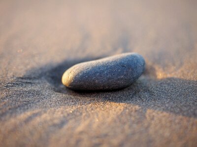 Sand sea pebble photo