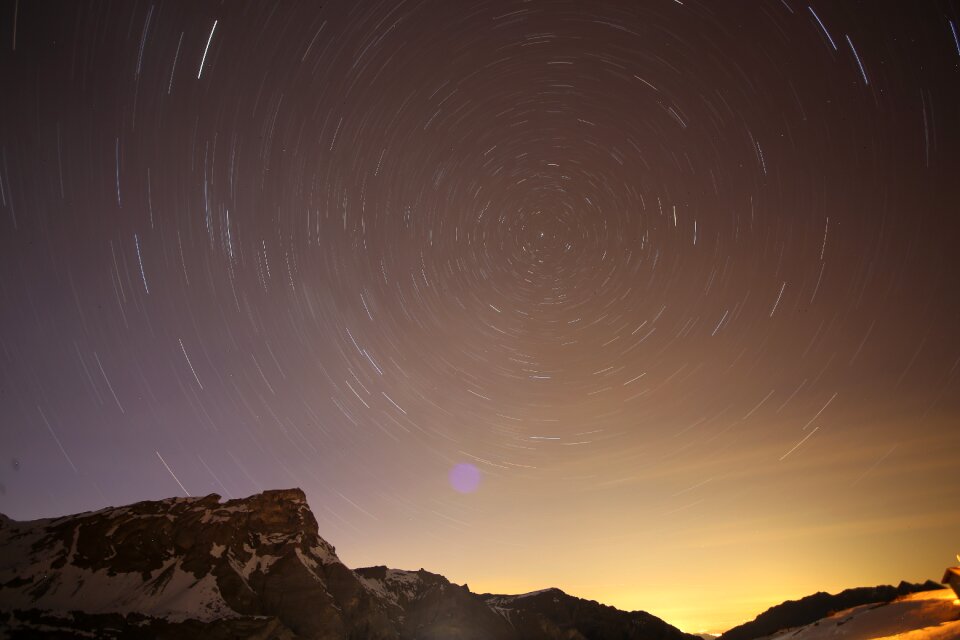 Alpine night sky rotation of the earth
