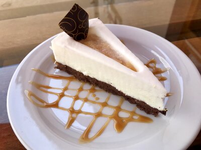 Foodstuffs cheese cake with peach puree candy