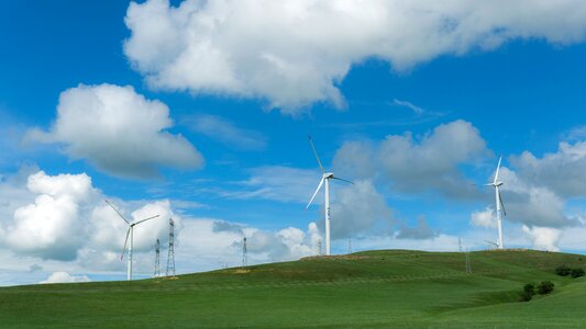Wind power generation prairie green grass photo