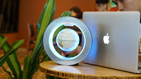 Floating globe mac technology photo