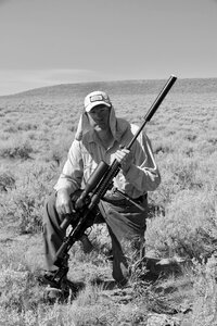 Sniper rifle man with rifle gun photo