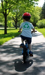 Three years old pedal power bike photo