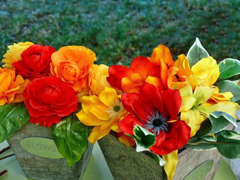 Faux flowers feast in the countryside bright colors