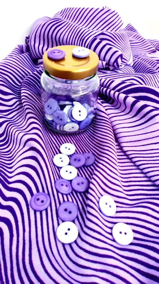 Textiles sewing button
