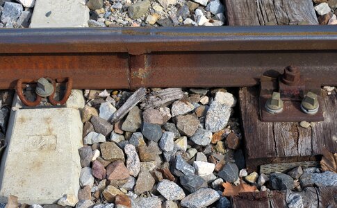 Gravel bed railway sleeper old and new photo