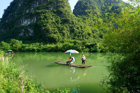 Yulong river boat bamboo raft photo