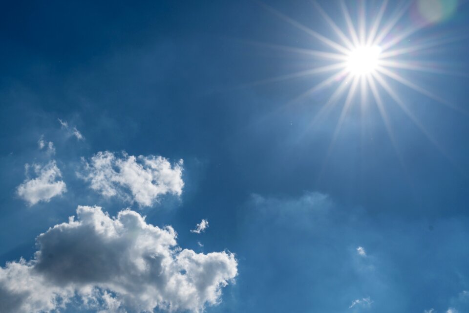 Sun clouds blue