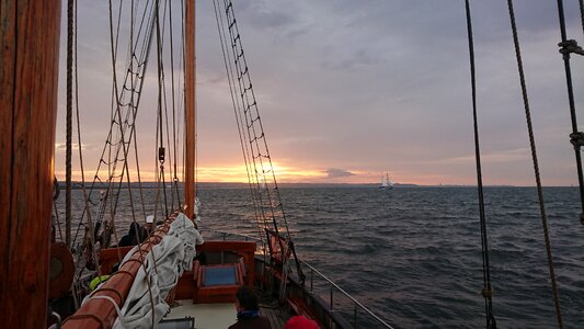 Sailing vessel sunset baltic sea photo