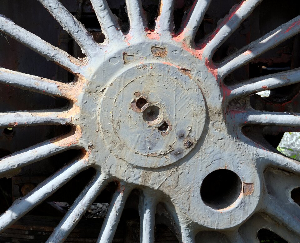 Weathered pin hole spokes photo