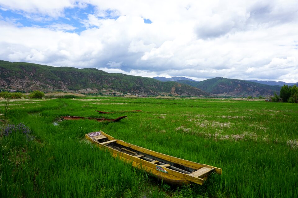Lake scenery green boat