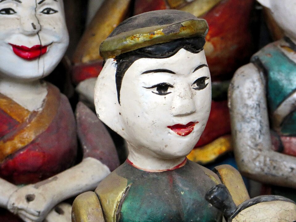 Character hanoi puppets on the water